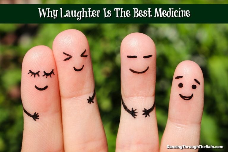 Fingers with laughing characters drawn on them