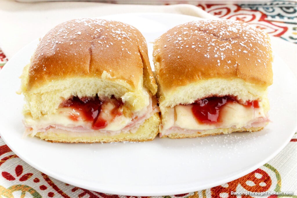 Two mini Monte Cristo sandwiches on a white plate
